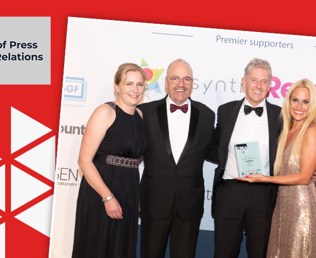 Ella Brocklebank, Martin Sandall of Jenner are stood alongside Fabrick's Colin Felton collecting their Best Use of PR awards at the 2022 Construction Marketing Awards