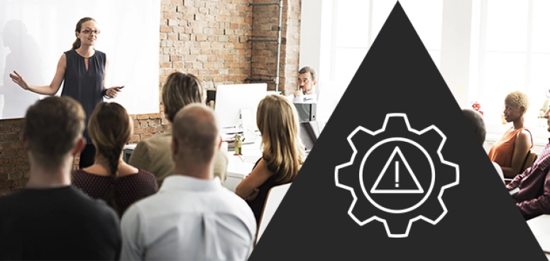 lady delivering crisis communications training to a room of people